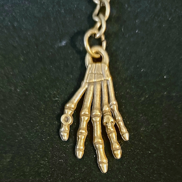 Brass Alloy Skeleton Hand With Skelton Ring Key Chain - Picture 2 of 4